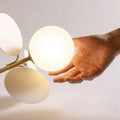Eli Glass Globes Linear Chandelier For Dining Room - 12 LightsGrayCool white 6000Klampmodern