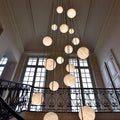 Nami Alabaster Sphere Staircase Chandelier Brass Multi Pendant Light - lampmodern